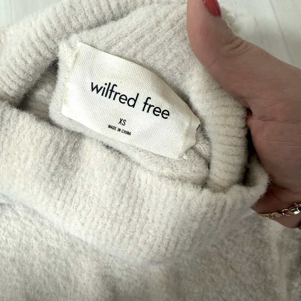 Wilfred mock neck sweater.